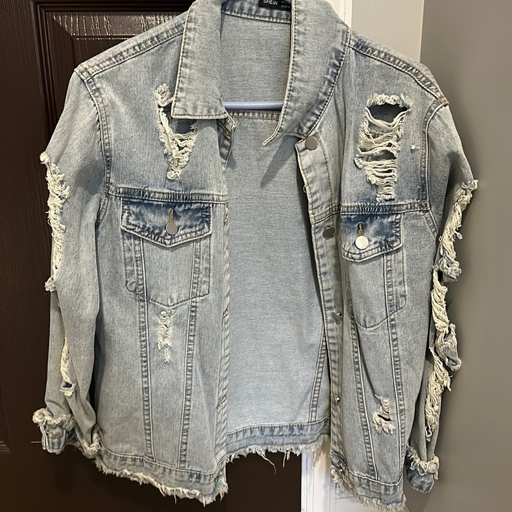 ripped jean jacket! size small!